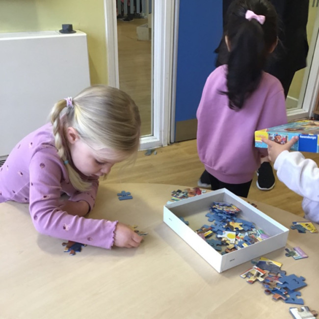 Child doing puzzles