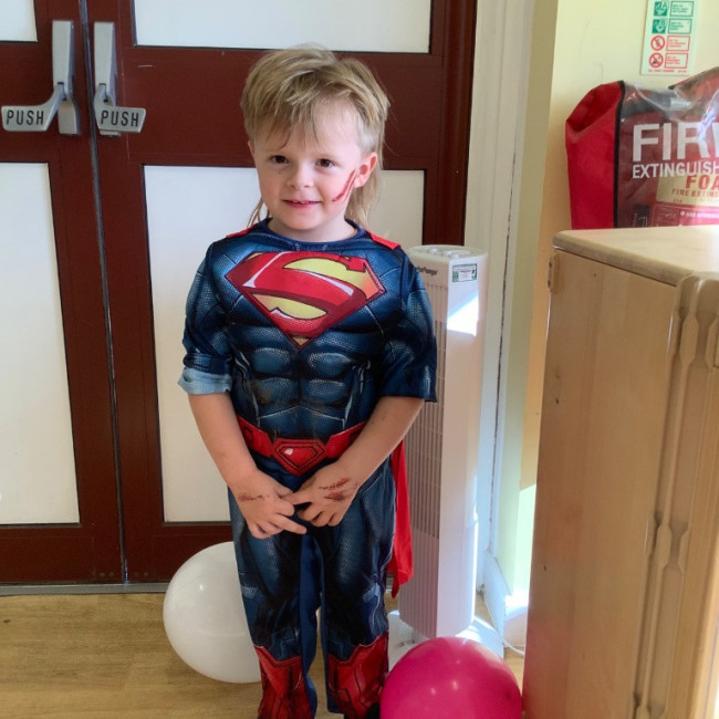 Child dressed as Superman