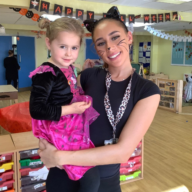 child and their teacher