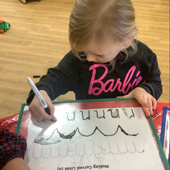 Child practising writing