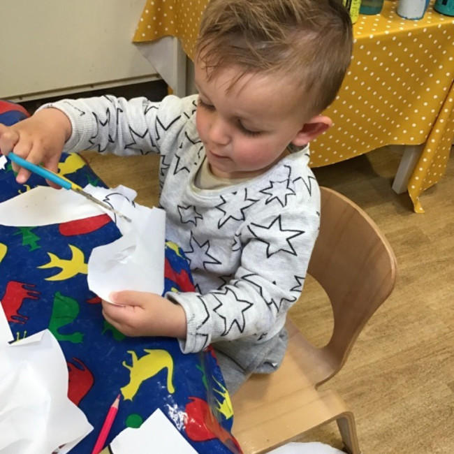Child doing crafts. 