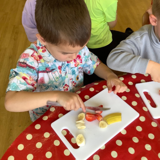 Child doing a craft. 