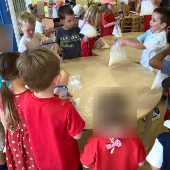 Children in a circle playing 