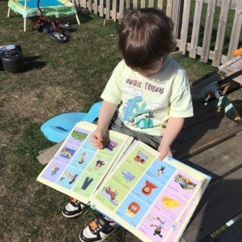 Child reading a book 