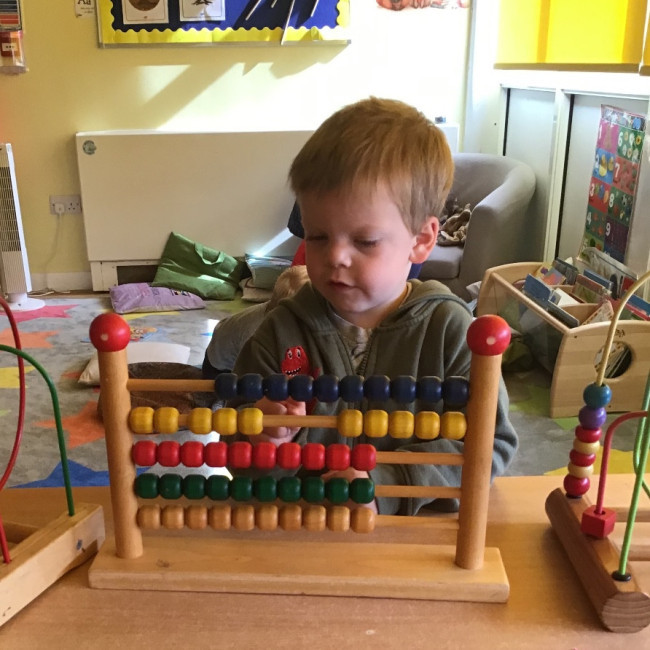 A child playing with a toy 