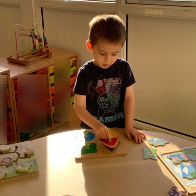 A child with a puzzle 